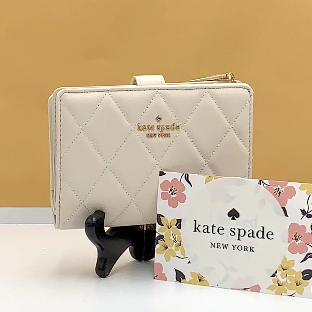 KATE SPADE Carey Medium Compact Bifold Wallet Parchment Color